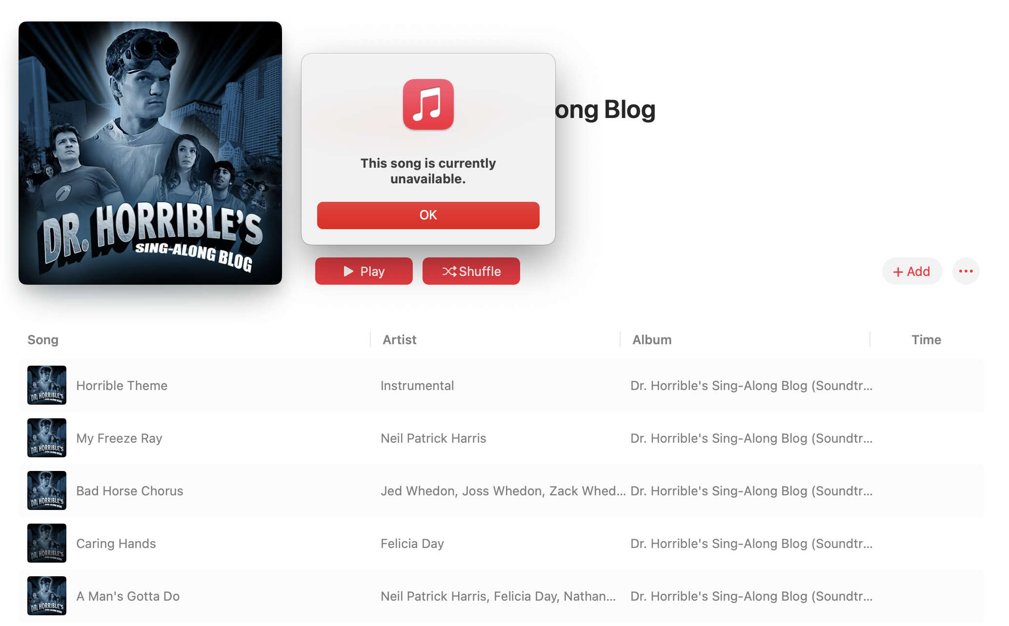 Screenshot of Apple Music showing an error alert.