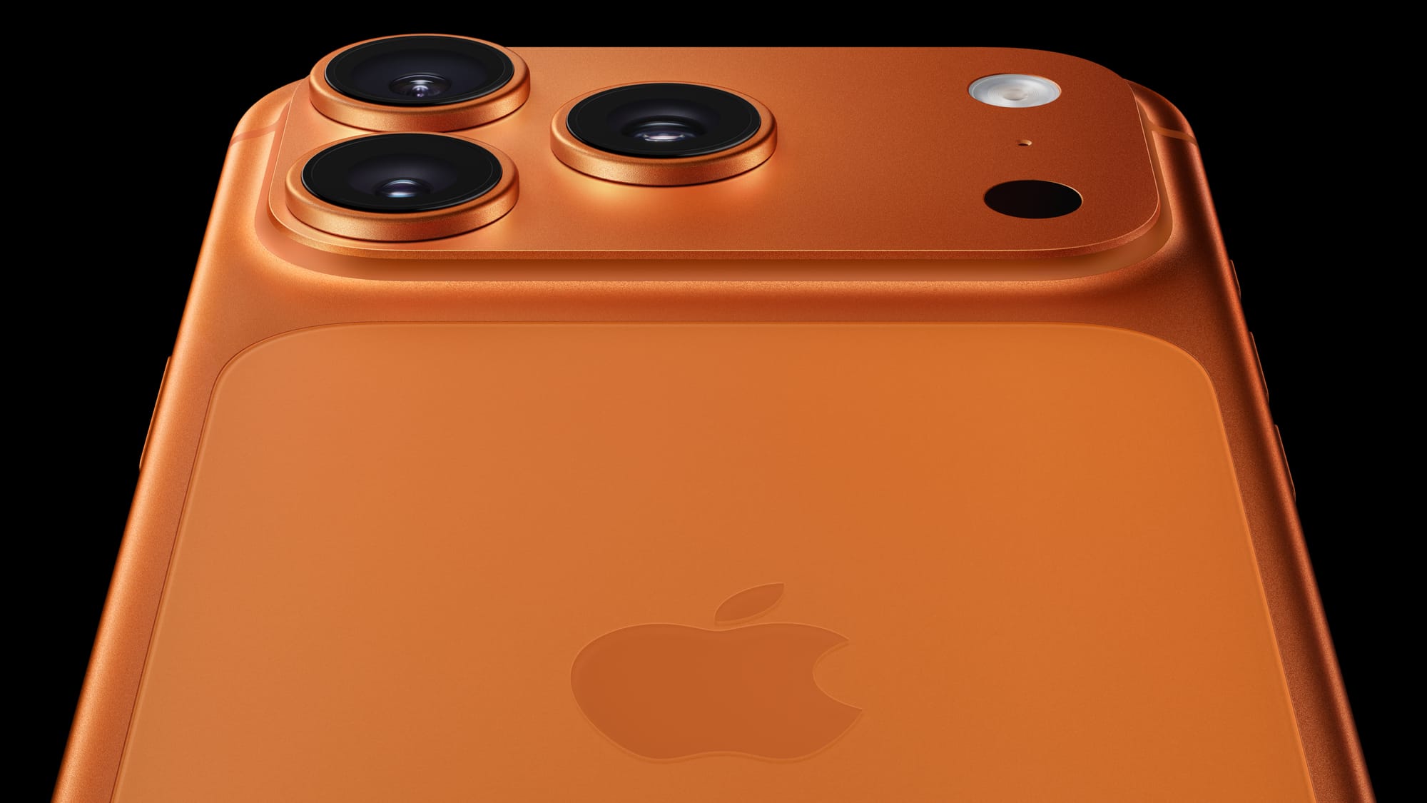 Close-up of the back of iPhone 17 Pro in Cosmic Orange