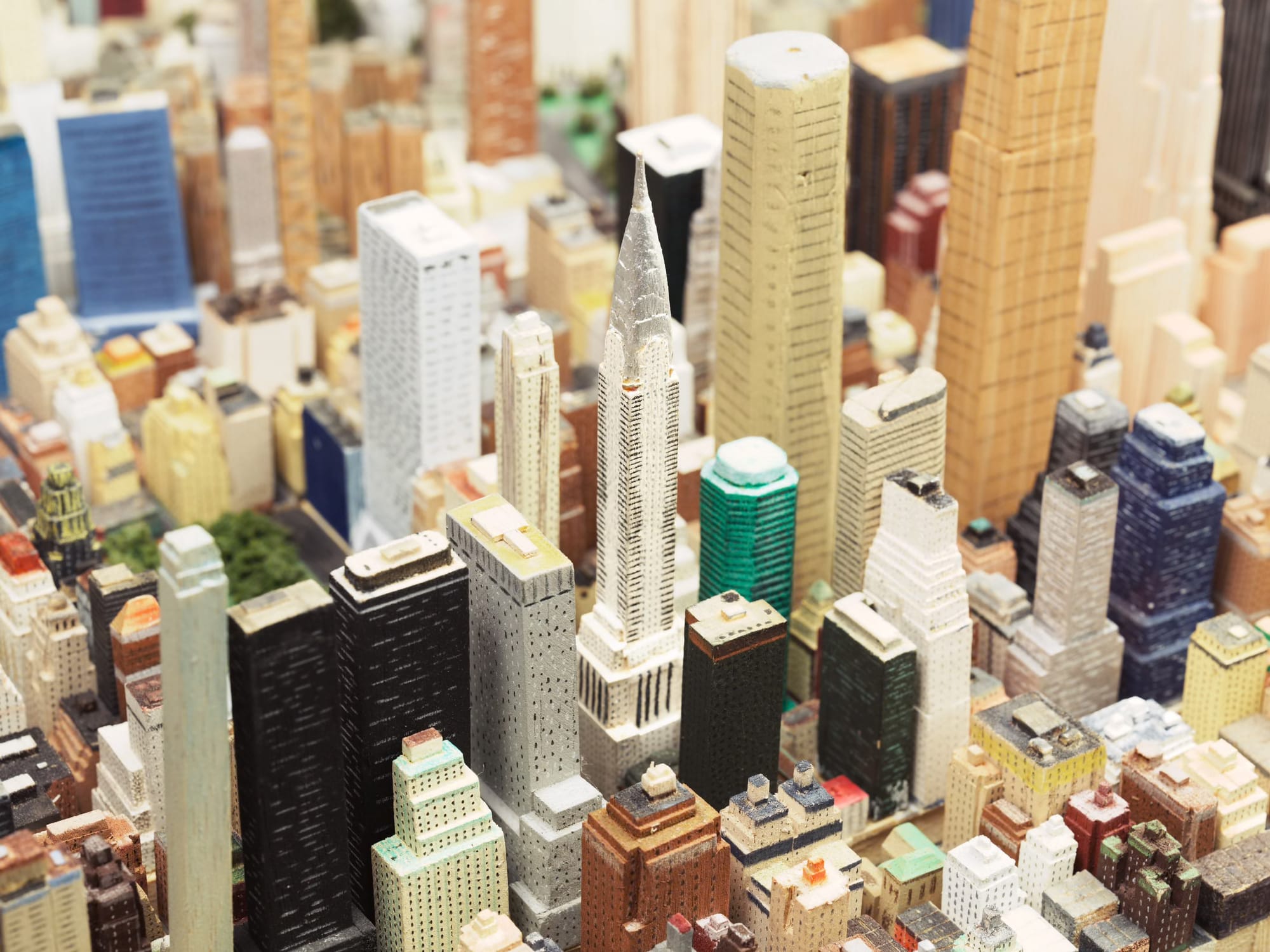 Close-up photo of a section of Joe Macken’s replica of New York City, centered on the Chrysler Building.